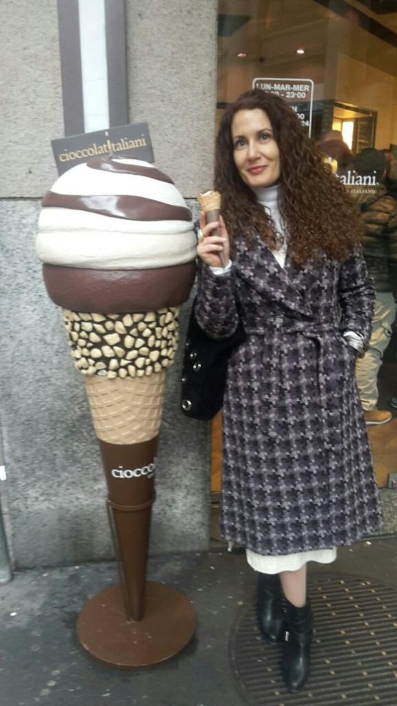 Arietta @ariettastraveltips enjoying a delicious gelato outside Cioccolatialiani, Milan, Milan