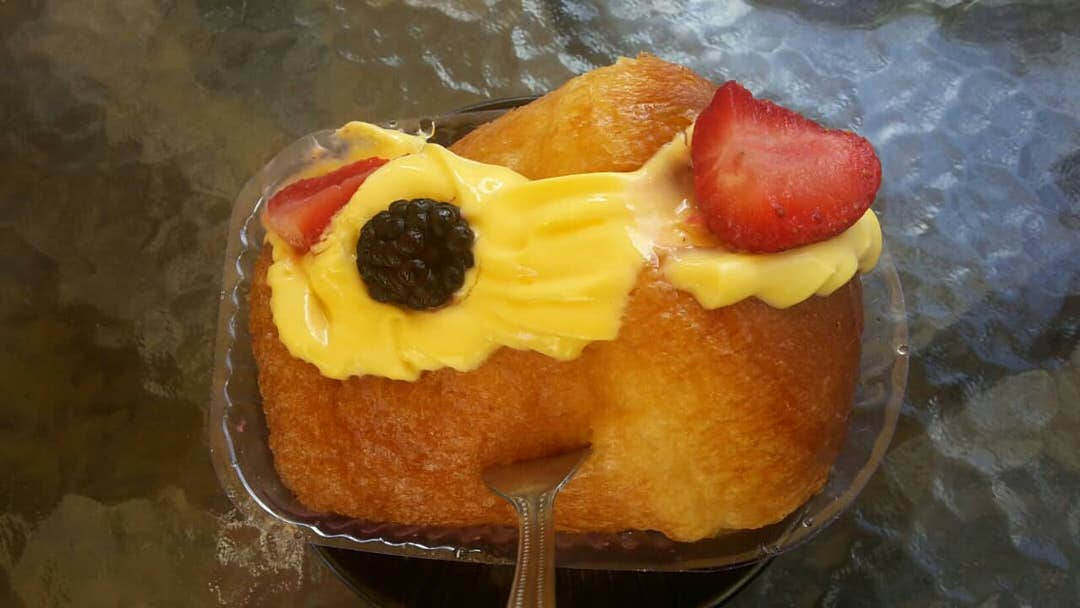 Babà au rhum or baba con panna, the popular Neapolitan dessert, in Naples, Italy.